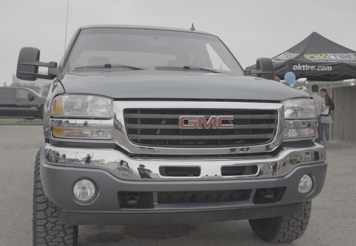 Canadian Auto Body Shop Returns Rebuilt GMC Sierra to Make-A-Wish Recipient